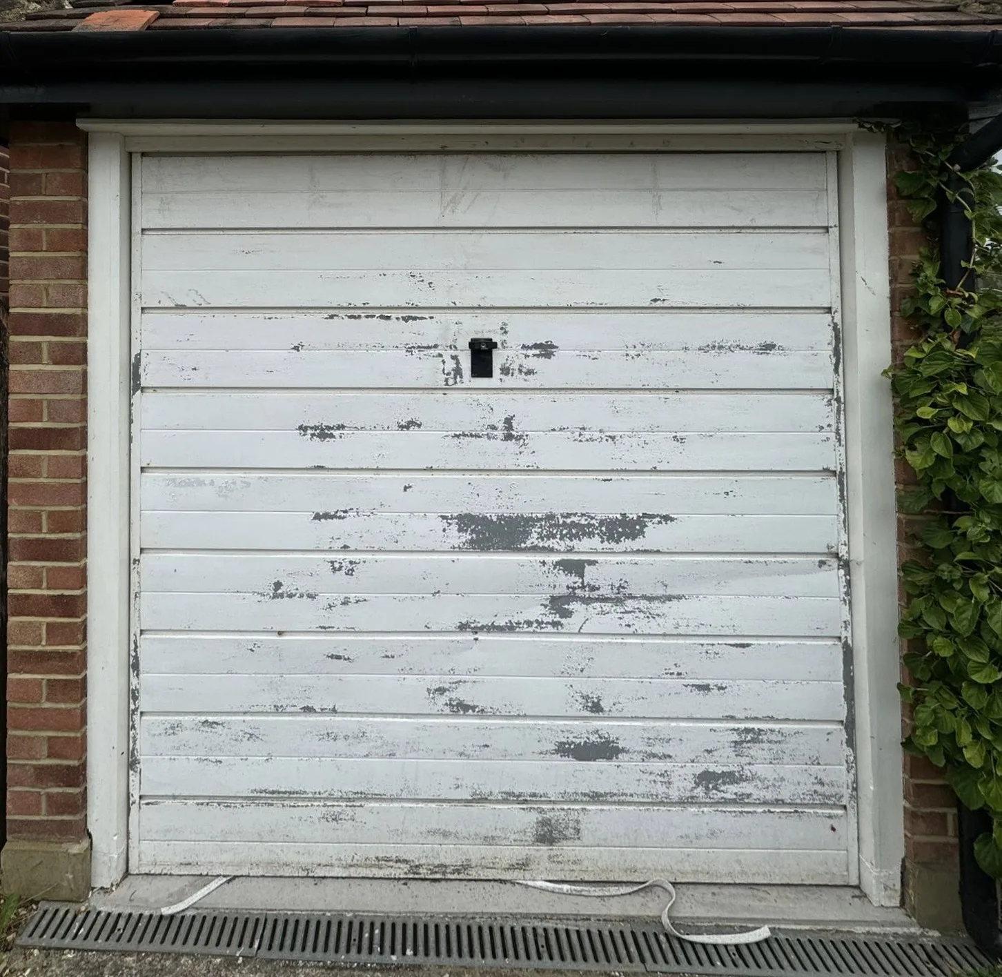 Old White Garage Door dus to be replaced