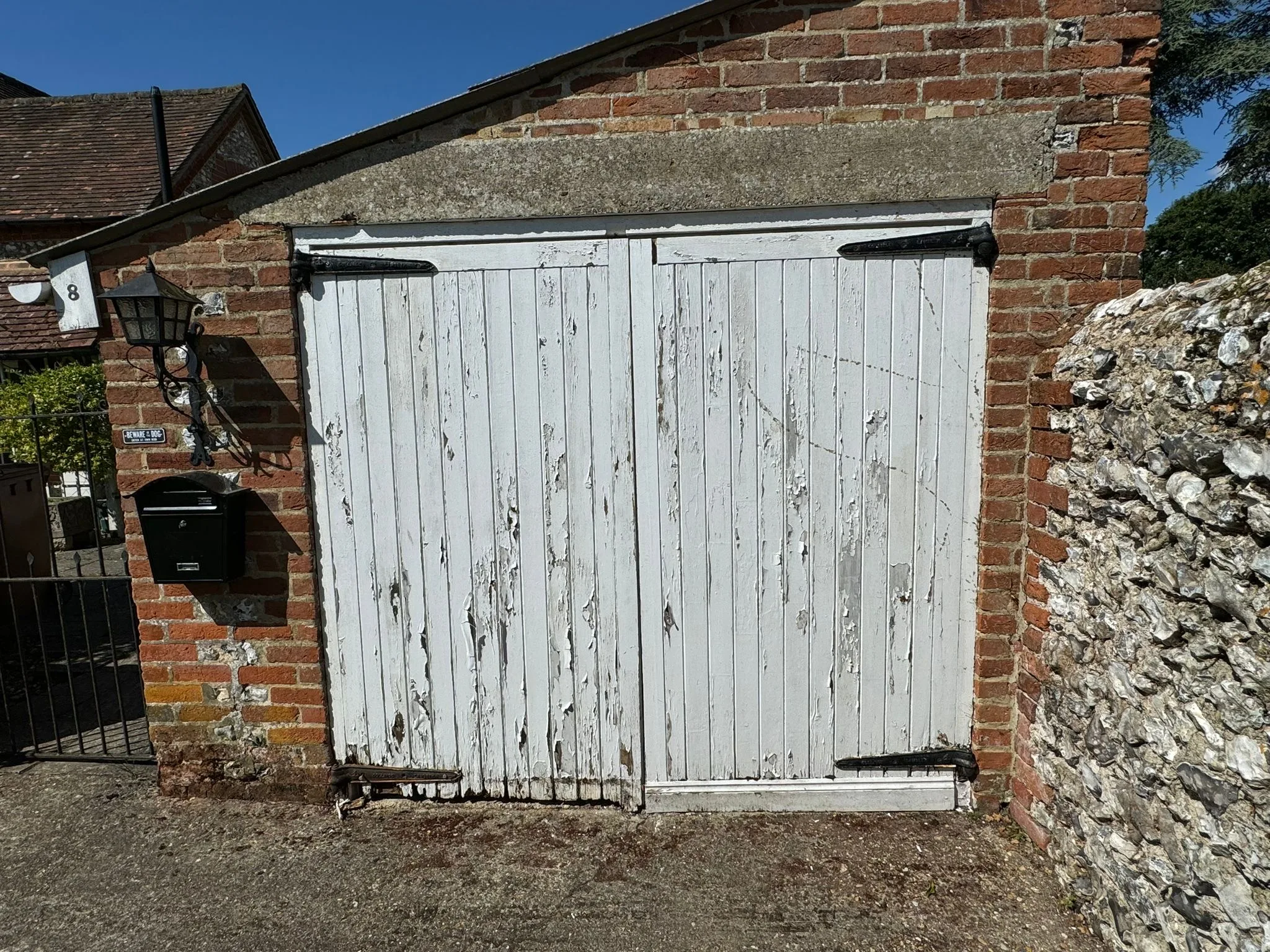 Old Side hinged garage door to be replaced.
