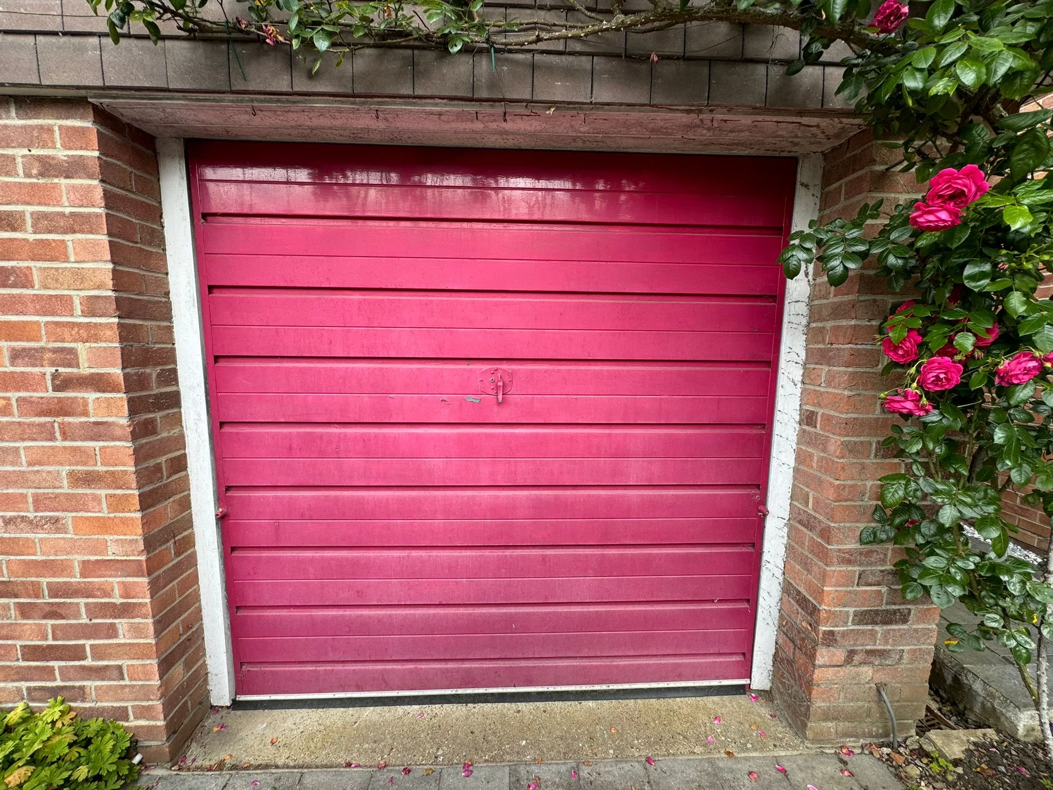 Old red Garage Door to be replaced
